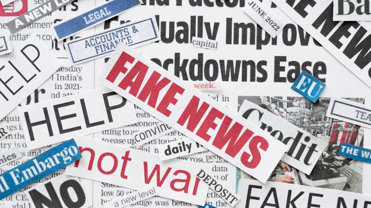 Newspaper clippings of fake news and other headlines that are known to cause strife or grab attention.